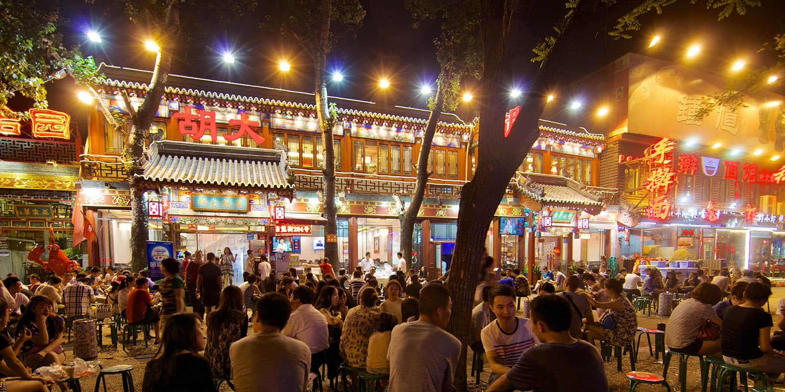 Människor på uteservering i Peking