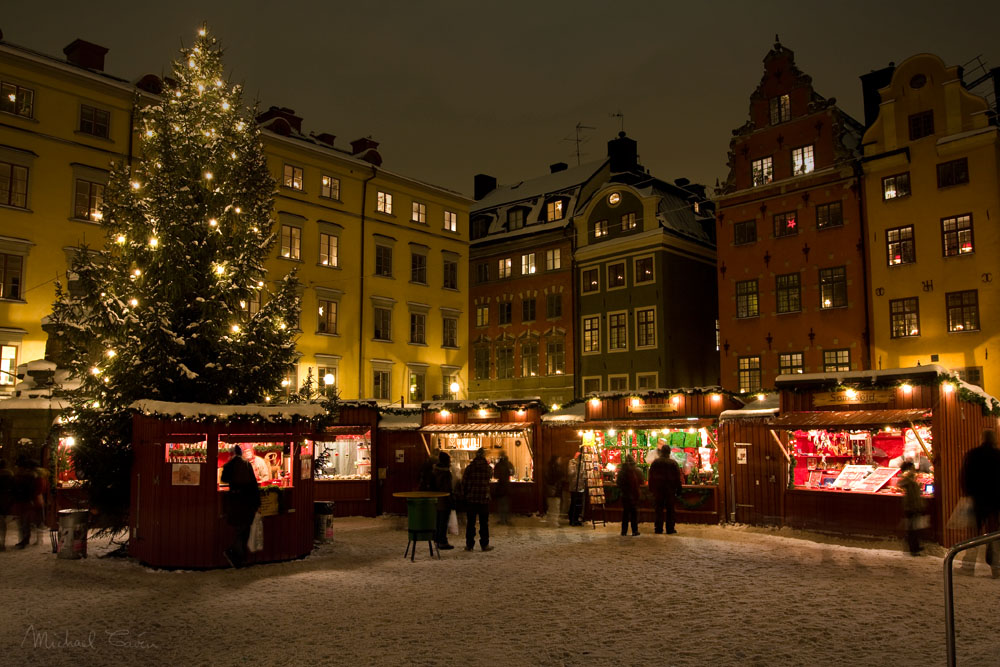 Christmas market in Stockholms Old Town during winter, evening.